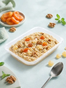 Каша пшеничная с орехами, курагой и ананасом